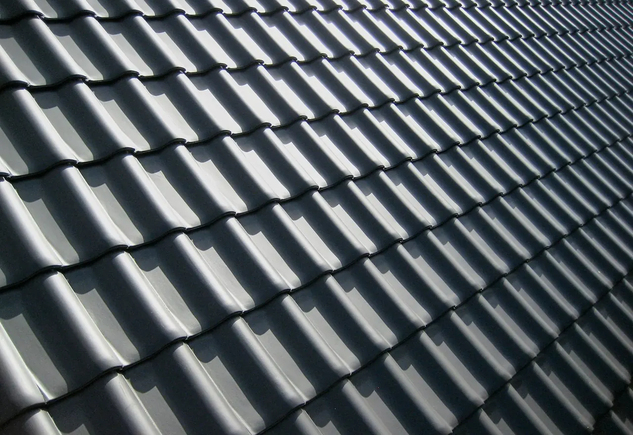 Newly laid interlocking tiles running to a dead-true course line